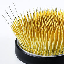 將圖片載入圖庫檢視器 Arrow showing the wide spread direction of the needle on the kenzan