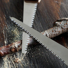Load image into Gallery viewer, Two folding saw blades laying on a branch
