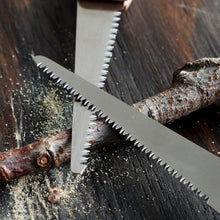 Laden Sie das Bild in den Galerie-Viewer, Two folding saw blades laying on a branch