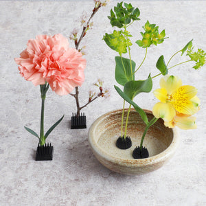 Mini black kenzan with flowers and an Ikebana bowl