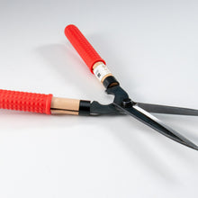 Laden Sie das Bild in den Galerie-Viewer, Pair of garden shears with red handles on a white background
