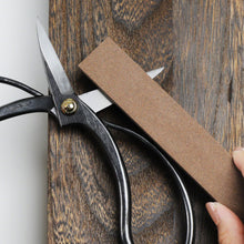 Load image into Gallery viewer, #240 Medium Grit Whestone sharepning a bonsai scissors blade
